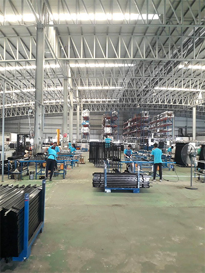 Finished aluminum fence panels in Royal Metal warehouse