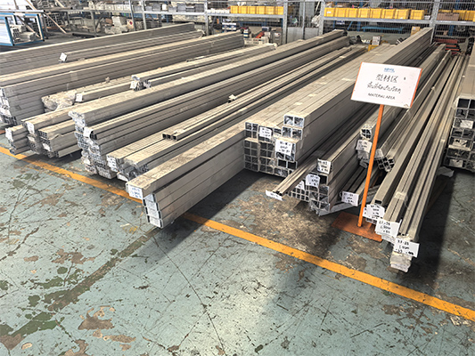 Raw aluminum billet storage for extrusion at Royal Metal factory